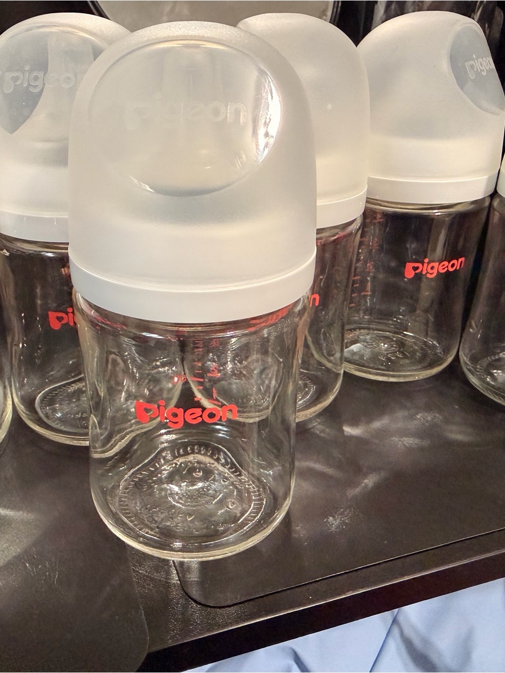 Pigeon and Poodle Clear Glass Baby Bottles with Frosted White Caps and Red Logo